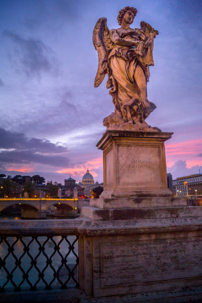 istock Italy - Rome -Angel at sunset 1129183686