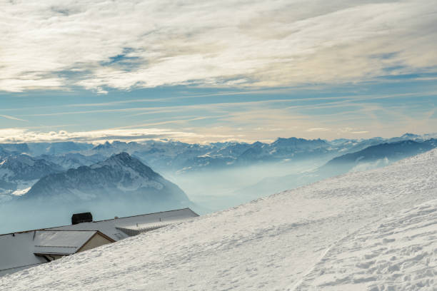 Beautiful view from top of snowy Mount Rigi in canton of Schwyz, Switzerland