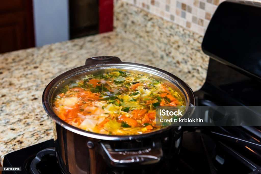 Large Big Pot Of Homemade Vegetable Soup And Granite Counter Top In Kitchen  In Stainless Steel Container On Gas Stove Cooking And Nobody Stock Photo -  Download Image Now - iStock