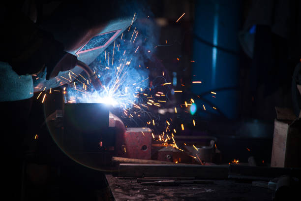 istock Industrial Welder With Torch 1129189179