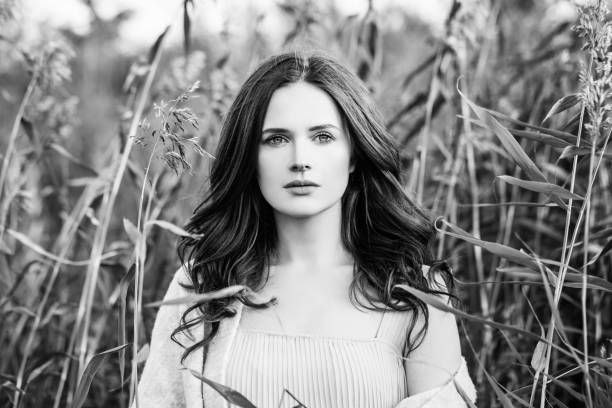 istock Young woman black and white portrait 1129191845