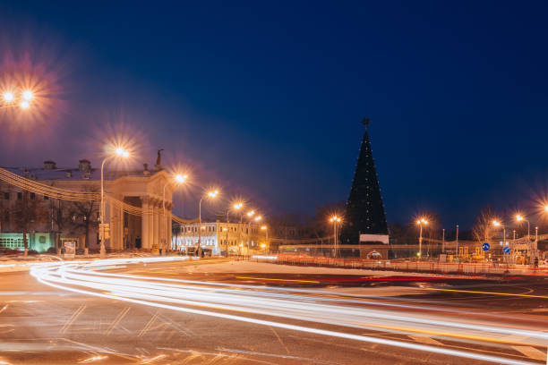 istock Night city square with traffic on the road 1129192496