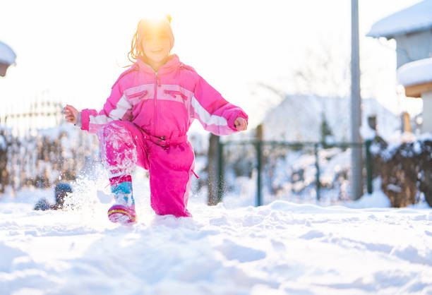 istock Happy girl on snow 1129192744