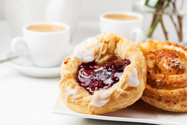 breakfast setup with danish pastries and coffee - pastry danish pastry bread pastry crust imagens e fotografias de stock