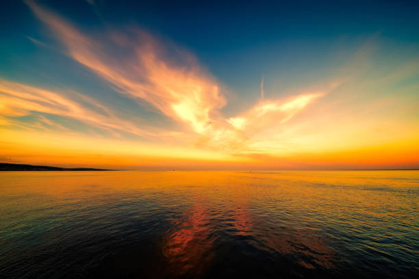 Amazing sunset clouds and reflection over Lake Superior Horizon at Duluth Minnesota