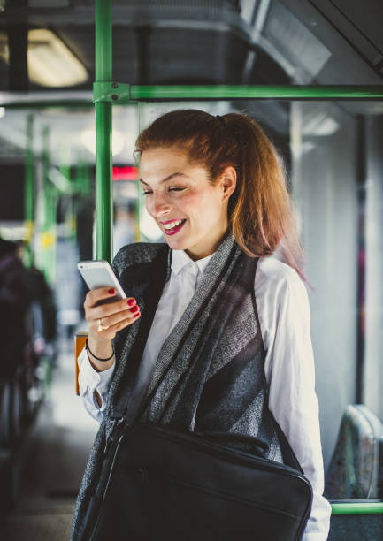 istock Young Businesswoman Taking Public Transportation 1129198884