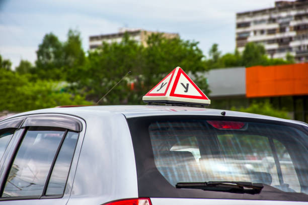 istock Driving school car sign 1129203212