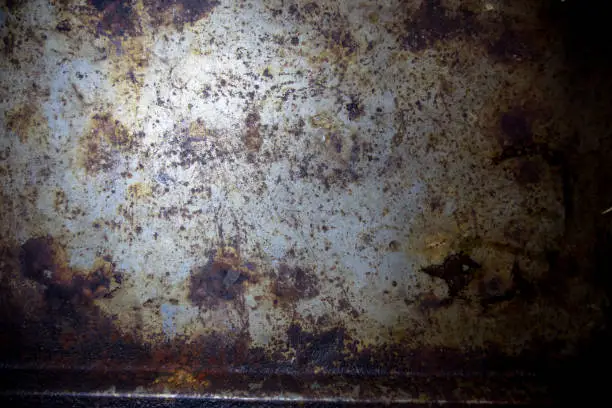 A rusty metal surface is filling the frame