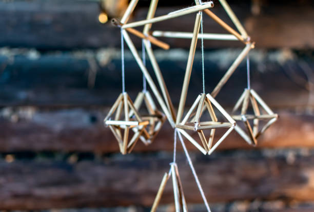 istock Latvian Puzurs hanging in the dark log hut 1129209727
