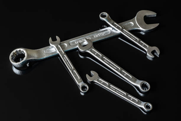 istock Screws, washers, nuts, keys for loosening and tightening 1129209759