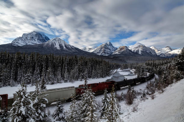 istock Morant's Curve with train in winter, Banff National Park, AB, Canada 1129212866