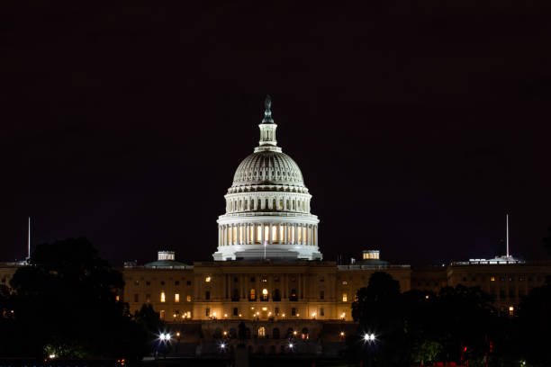 istock United States Capitol in Washington DC at night 1129219695