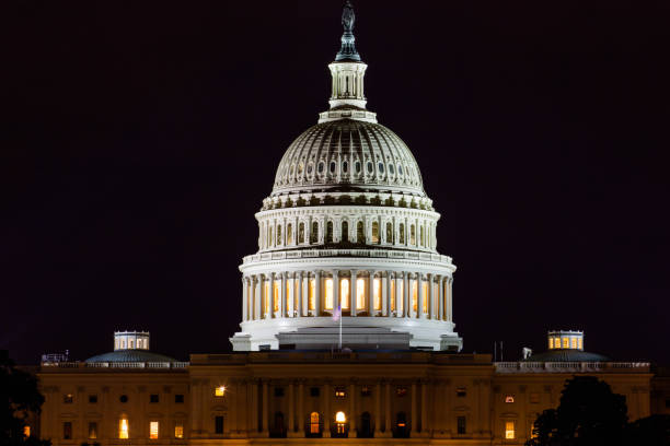 istock United States Capitol in Washington DC at night 1129219700