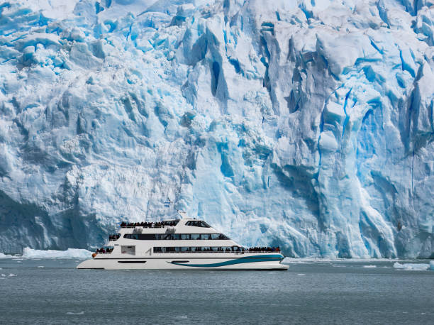 istock Tour boat near glacier 1129219751