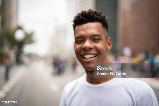 Afro Latinx Young Man In The City Portrait Stock Photo - Download Image Now - Teenager, African-American Ethnicity, Men