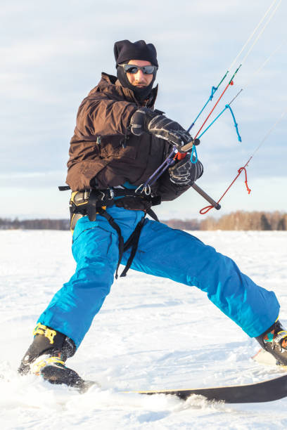 istock The skier goes on the snow field with kyte 1129220865