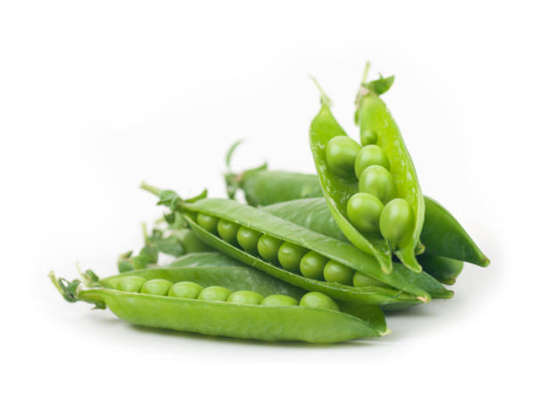 istock green peas in pods on a white background 1129222002