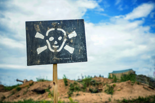 istock sign of danger announcing about mined fields in front 1129227019