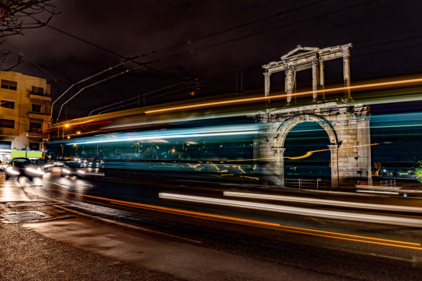 istock Light trails of moving cars 1129230882