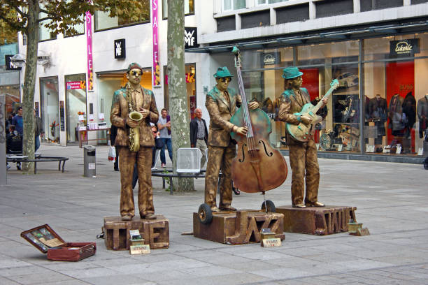 Stuttgart, Germany - September 14, 2010: Street performers The Jazz Statues playing music on the street of Stuttgart