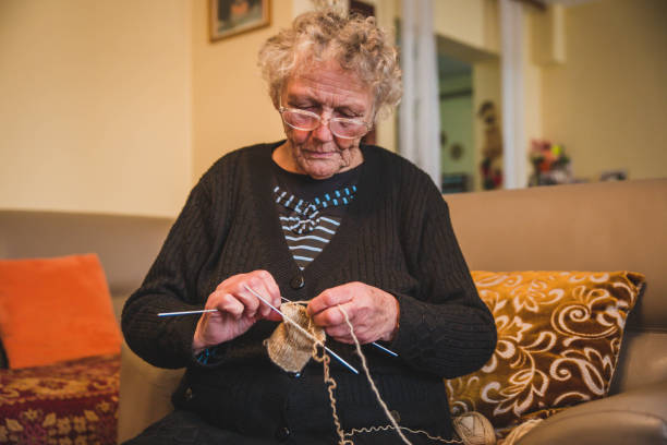 istock grandmother knitting 1129233953