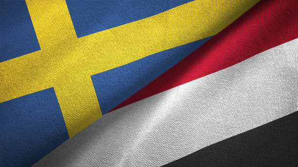 istock Sweden and Yemen two flags textile cloth, fabric texture 1129235676