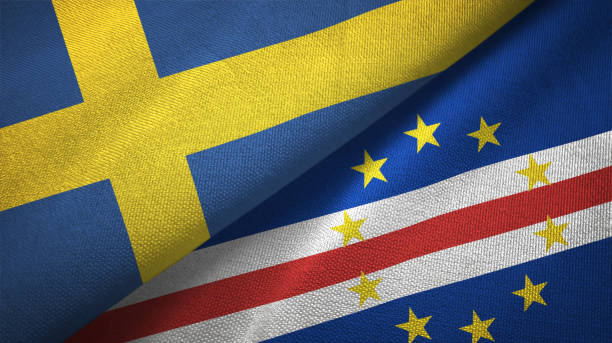 istock Sweden and Cape Cabo Verde two flags textile cloth, fabric texture 1129235700