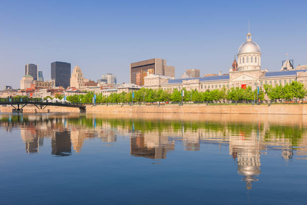 Stock photograph of waterfront and skyline in Old Montreal Canada on a sunny day.
