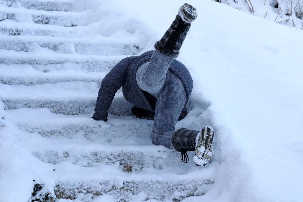 istock A woman slipped and fell on a wintry staircase 1129237419
