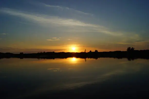 Sunrise on the banks of the madre river in the city of Palhoça in Santa Catarina, Brazil