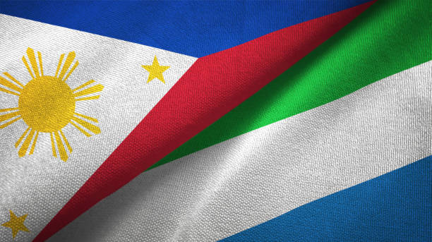 istock Philippines and Sierra Leone two flags textile cloth, fabric texture 1129244527