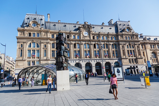 Paris, France - August 05, 2014: modern entrance in front of the Gare St. Lazare with unidentified people. Its the 2nd busiest rail station in Europe with 100,000,000 passengers a year