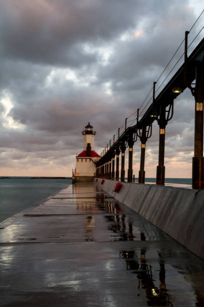 istock Michigan city lighthouse at dawn. 1129249642