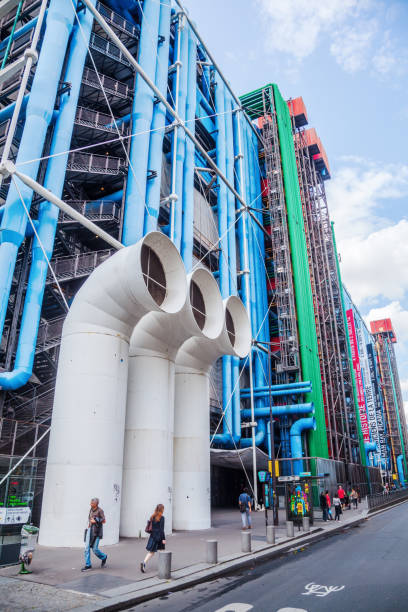 facade of the Centre Pompidou in Paris, France Paris, France - August 04, 2014: facade of the Centre Pompidou in Paris, with unidentified people. It was designed in style of hightech architecture by architects Richard Rogers, Renzo Piano and Gianfranco Franchini. pompidou center stock pictures, royalty-free photos & images