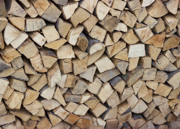 istock Background with chopped wooden logs 1129251304
