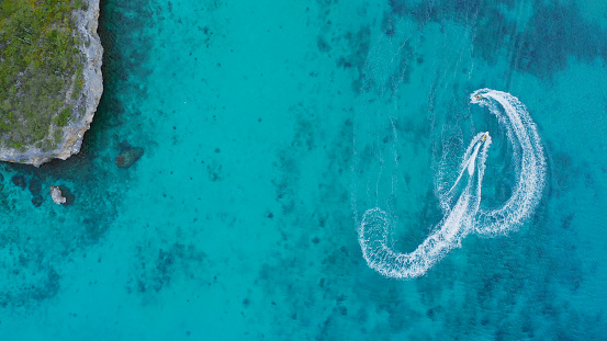 Aerial View of People on Jetski in Caribbean Sea, Curacao