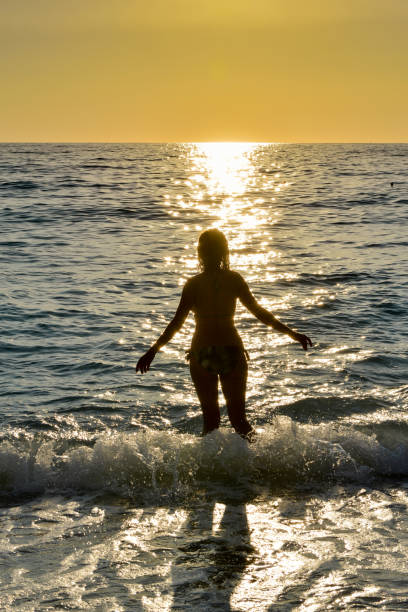 istock Happy woman having fun at sea. 1129267582