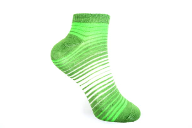 istock green and white stripe socks isolated on white background 1129274878