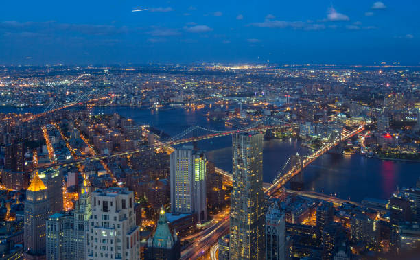 istock Brooklyn bridge aerial view at night 1129282170