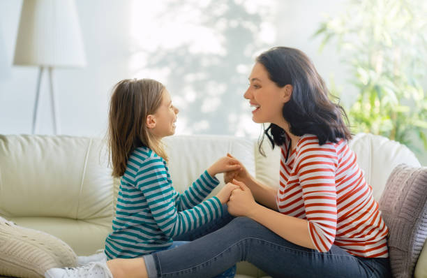 istock mother and daughter playing 1129283093