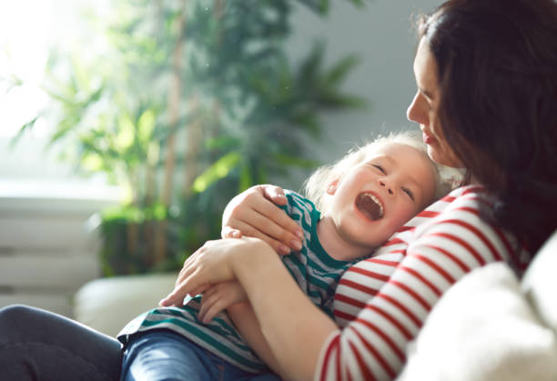 istock mother and daughter playing 1129283170