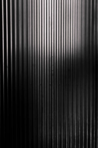 istock Grey grunge metal textured background. Metal corrugated background with free space for text. 1129287065