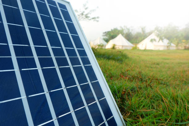 istock Solar panels or Solar cells energy and tents camping. 1129298145