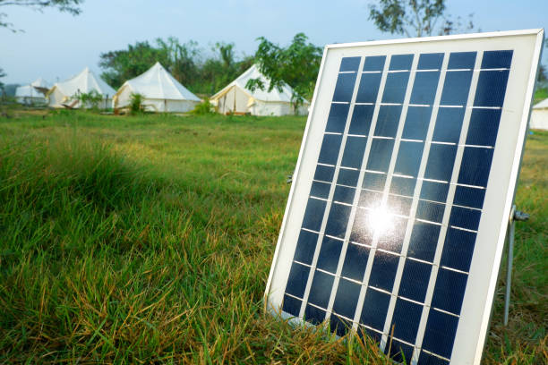 istock Solar panels or Solar cells energy and tents camping. 1129298150