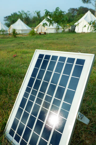 istock Solar panels or Solar cells energy and tents camping. 1129298676