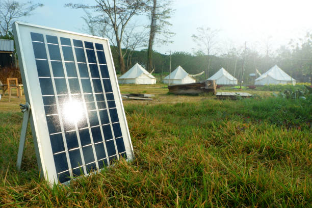 istock Solar panels or Solar cells energy and tents camping. 1129298695
