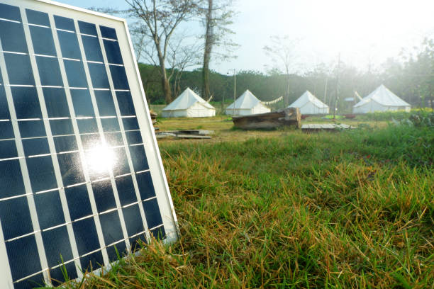 istock Solar panels or Solar cells energy and tents camping. 1129298697