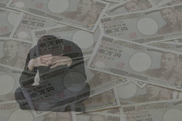 nachdenken über geld probleme beim mann - japanischer yenschein stock-fotos und bilder