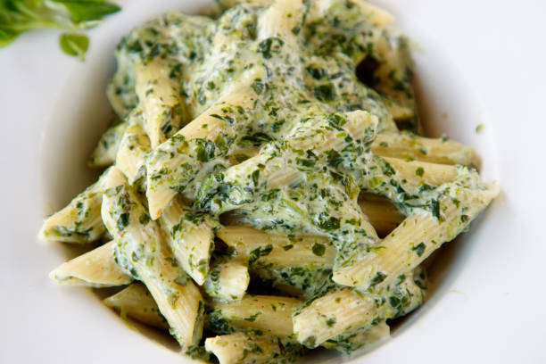 Pasta penne rigate with homemade pesto sauce