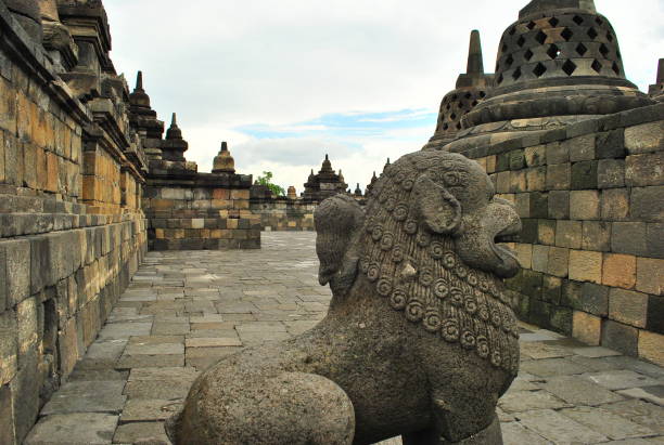 istock Ancient Buddhist heritage and sacred stone temple Borobudur in Java Indonesia 1129305430